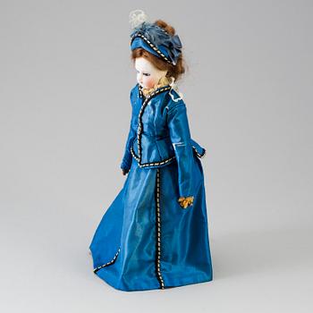 A bisque head fashion doll, probably France, late 19th century.