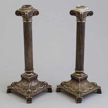 A pair of plated candel sticks from the fist half of the 20th century.