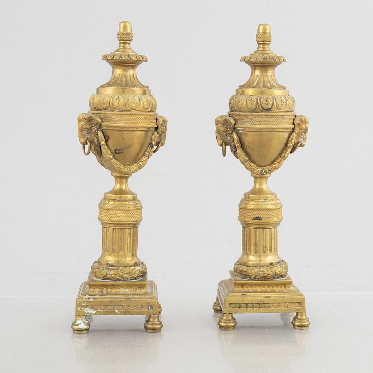 A pair of Louis XVI-style candlesticks, late 19th century.