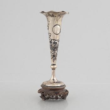 A Chinese silver vase, around 1900.