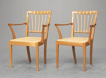 A pair of Josef Frank chairs, Firma Svenskt Tenn, model 1165.