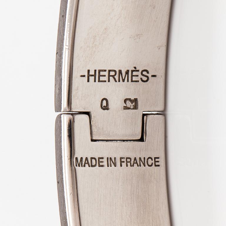 Hermès, armband, "Clic H PM", silverfärgad metall och svart emalj.