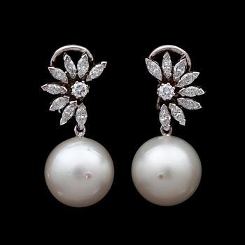 1148. A pair of cultured pearl and diamond 1.74 cts earrings.