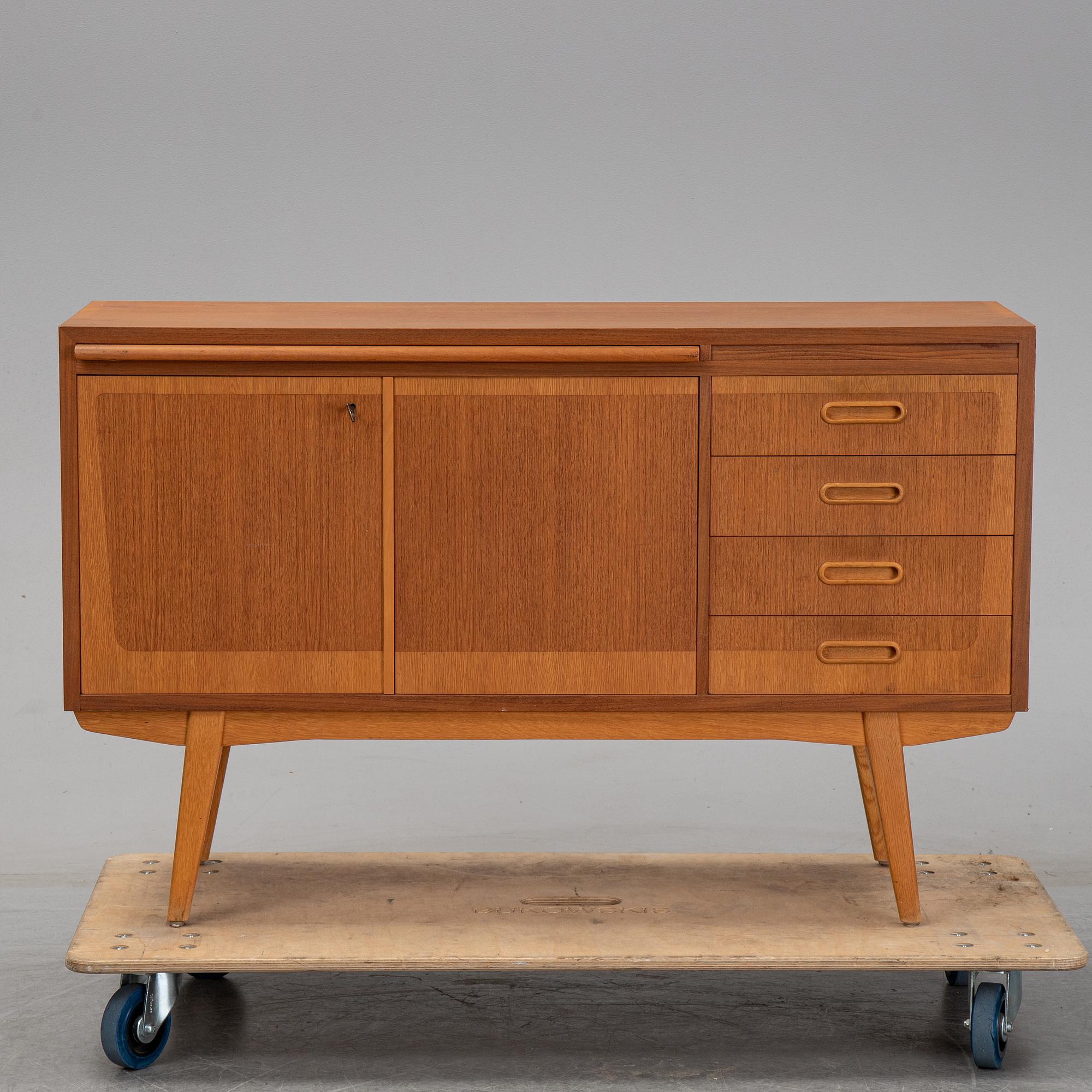 A 1950's teak sideboard.