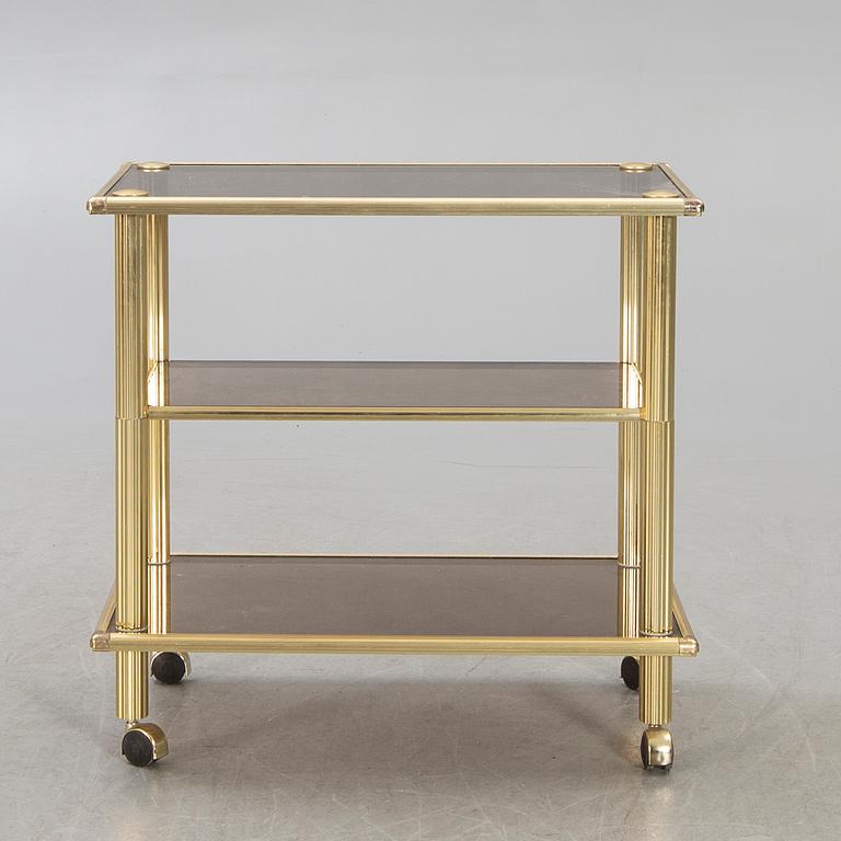 A brass serving trolley later part of the 20th century.