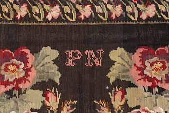 A Kelim carpet, Moldova, dated 1939, circa 385 x 174 cm.
