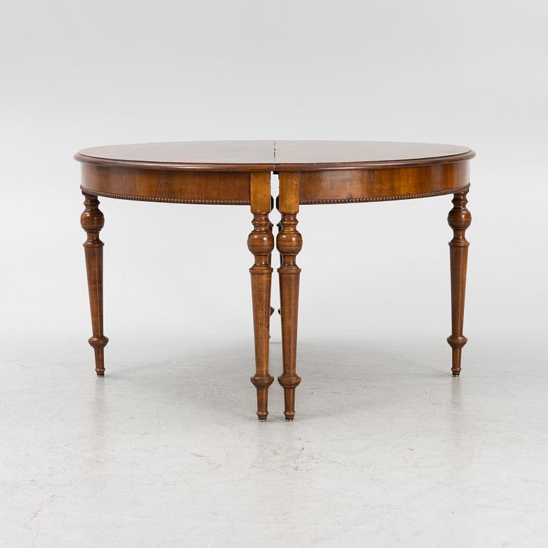 A dining table, late 19th Century.