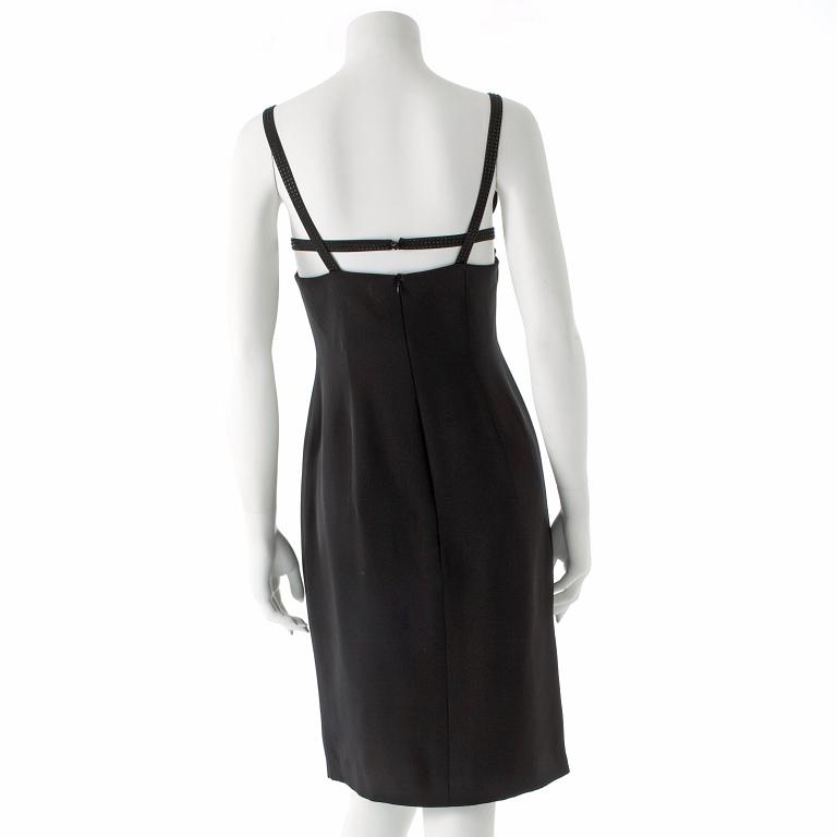 ESCADA, a black cocktail dress with rhinestones.