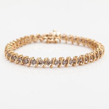 A 14K gold bracelet with light brown diamonds ca. 2.38 ct in total.
