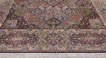 A Kirman lavash milifleur carpet, 400 x 310 cm.