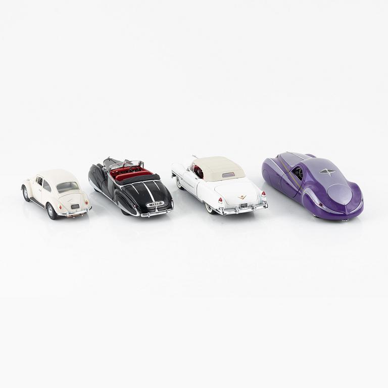 Four die cast model cars and four die cast model motor bikes, Franklin Mint.