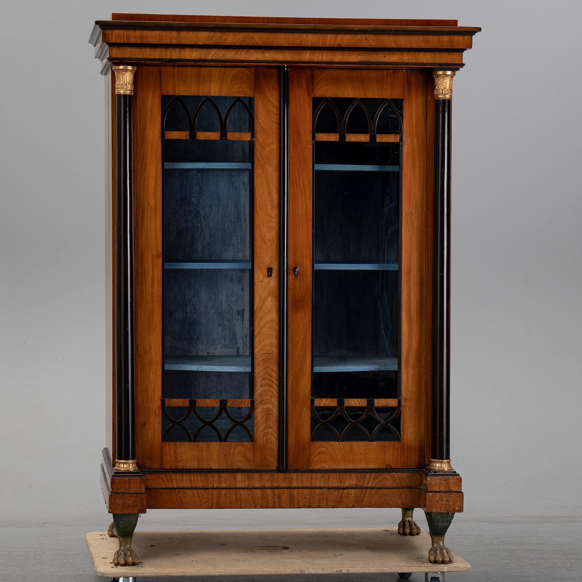 An Empire mahogany cabinet, first half of the 19th Century.