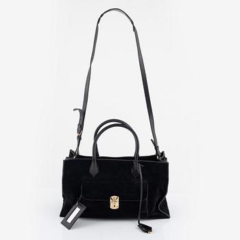 Balenciaga, A black suede and leather bag.
