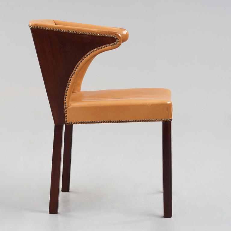 Frits Henningsen, a stained mahogany and brown leather armchair, Denmark.