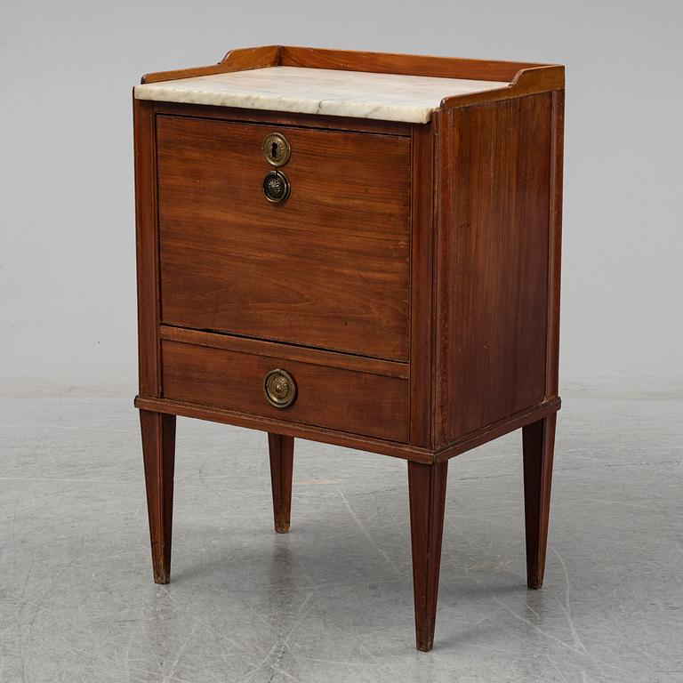 A Swedish late Gustavian mahogany with marble top bedside table, ca 1800.