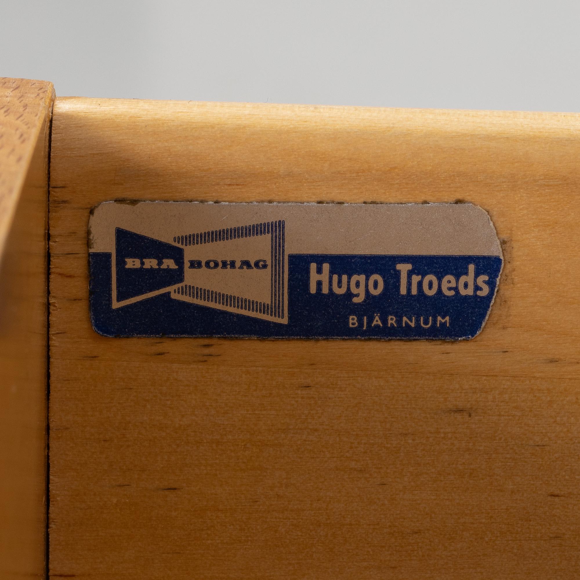 A desk with a drawer unit, Bra Bohag, Hugo Troeds, Bjärnu, mid 20th Century.