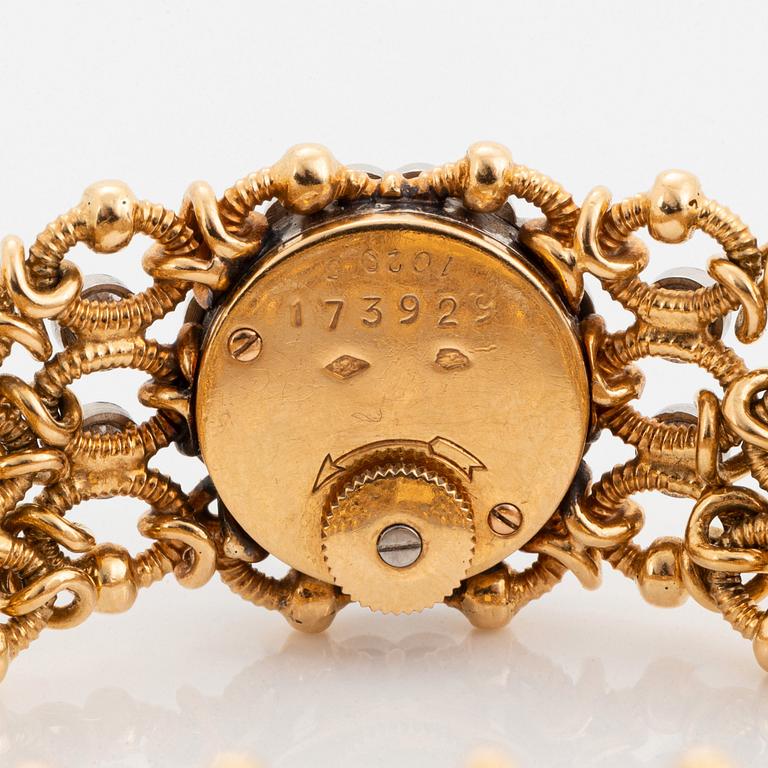 A Cartier wristwatch.