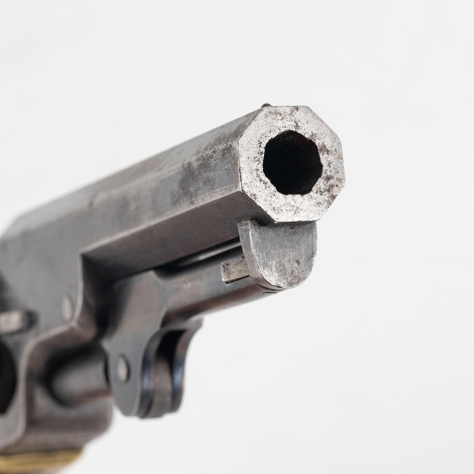 A Colt 1849 Pocket Revolver.
