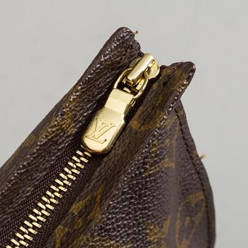 a LOUIS VUITTON toilet bag.