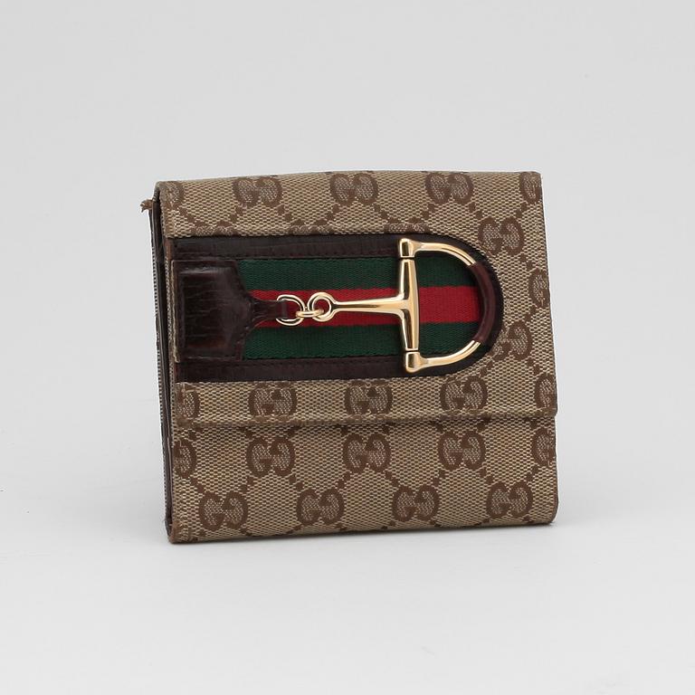 GUCCI, beige monogram canvas ballerina shoes, wallet, scarf and a shoulder bag.