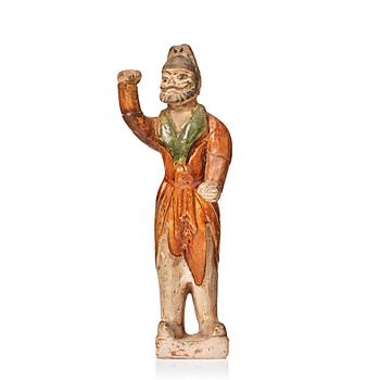 750. A pottery figure of a animal keeper, Tang dynasty (618-907).