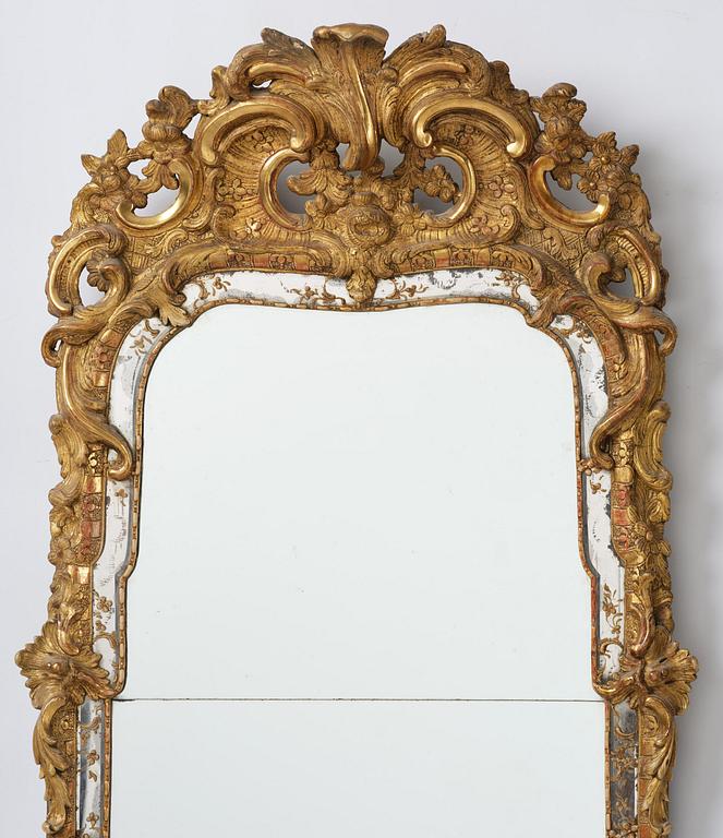A rococo giltwood mirror attributed to N. Meunier (master in Stockholm 1754-97).