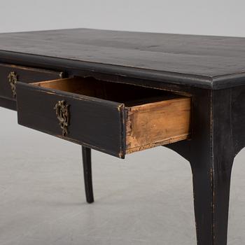 A partially rococo, 18th century writing desk.