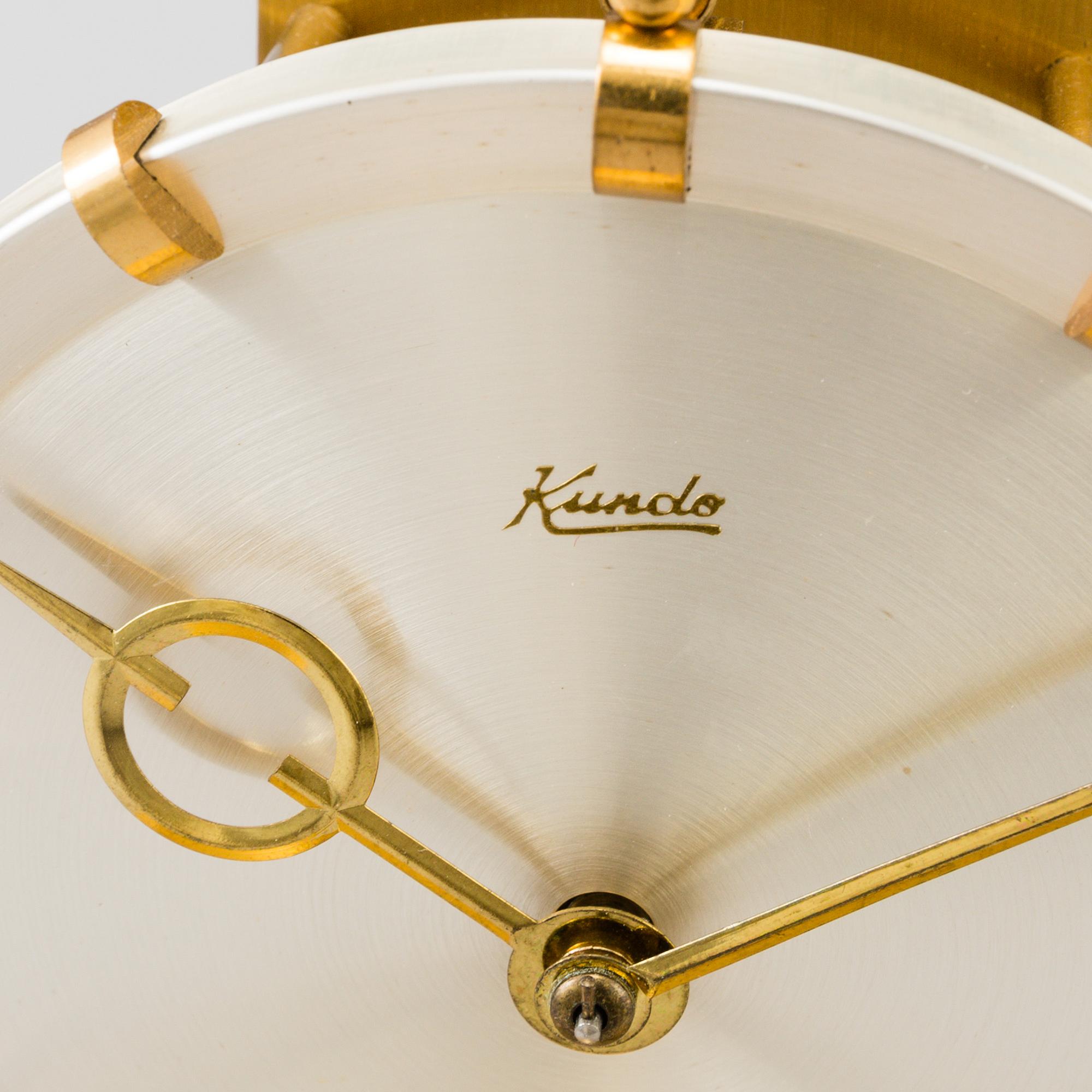 A table clocks, brass, Kundo, 20th century.