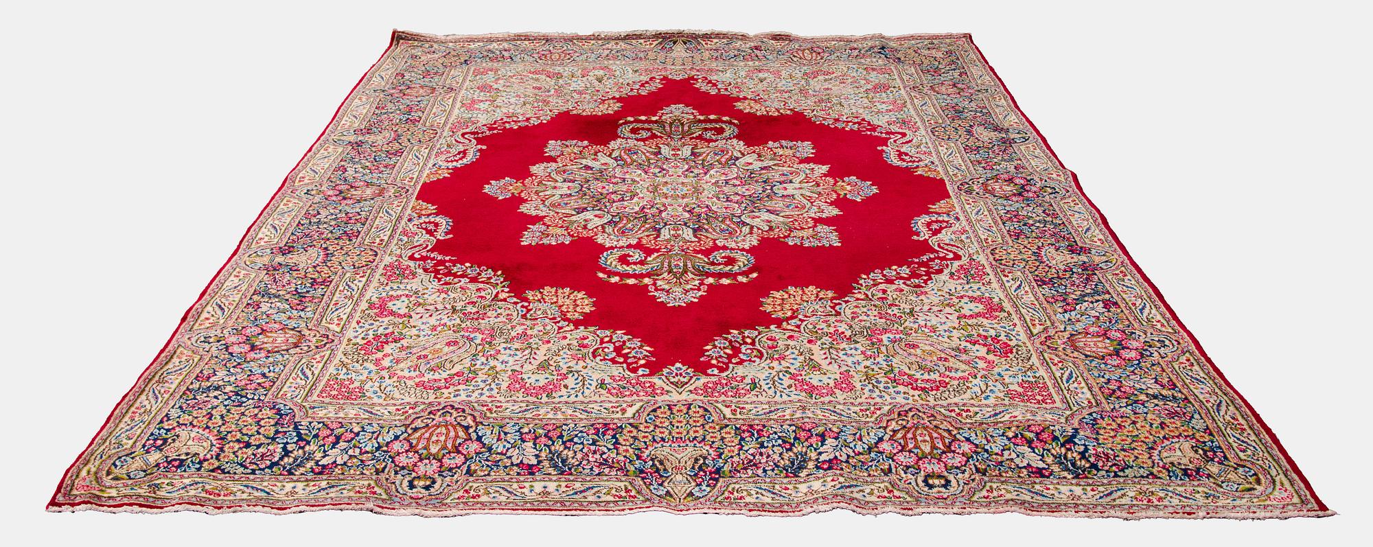 A carpet, Kirman, ca. 333 x 244 cm.