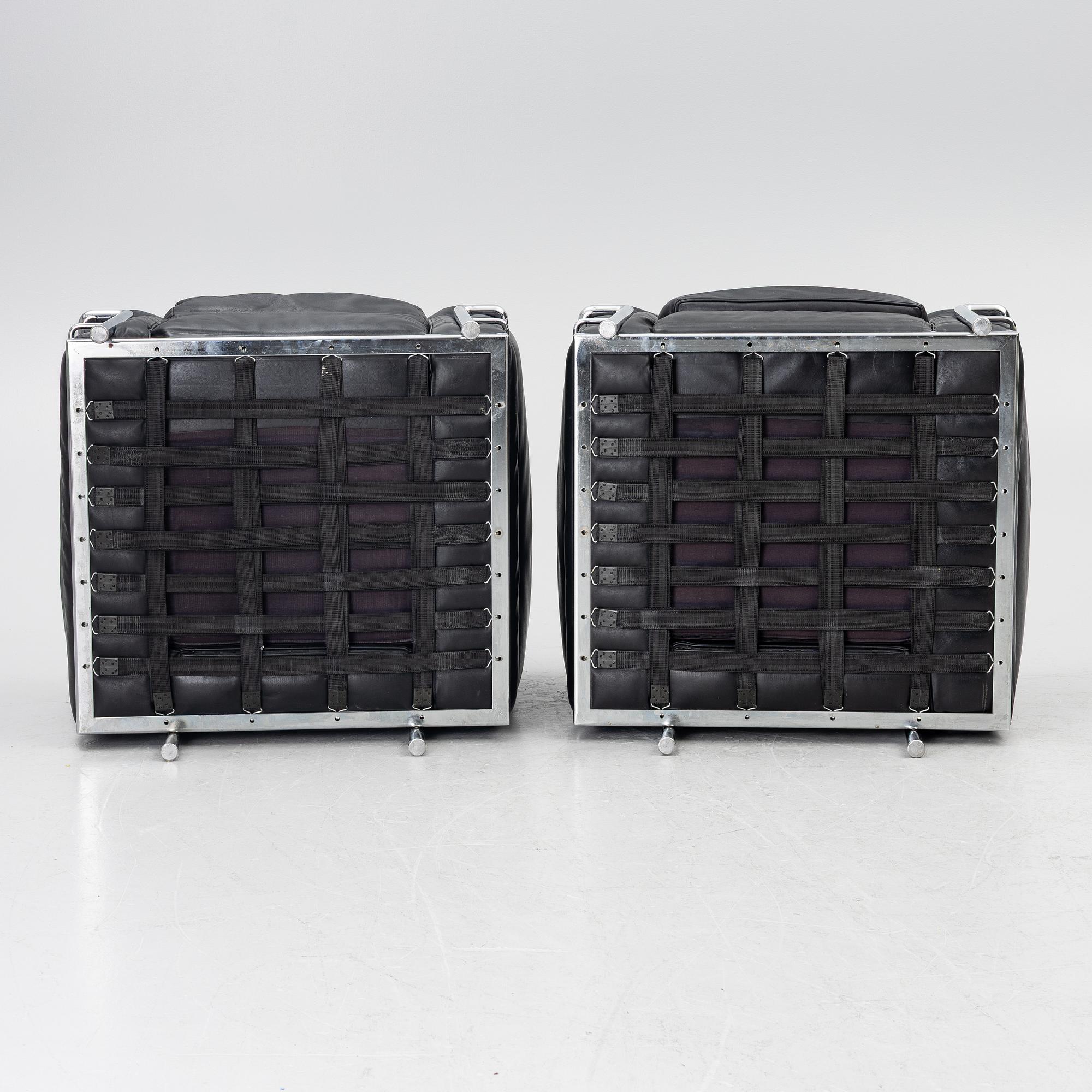 a pair of "LC2" armchairs, Cassina, second half of the 20th century.