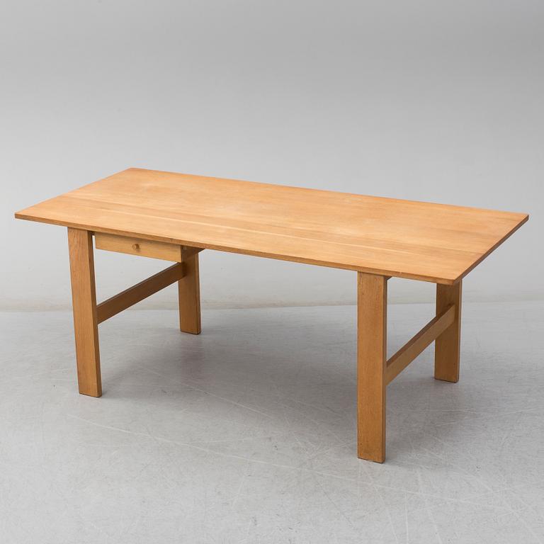 A second half of the 20th century oak table, 'Fogar', by John Kandell.