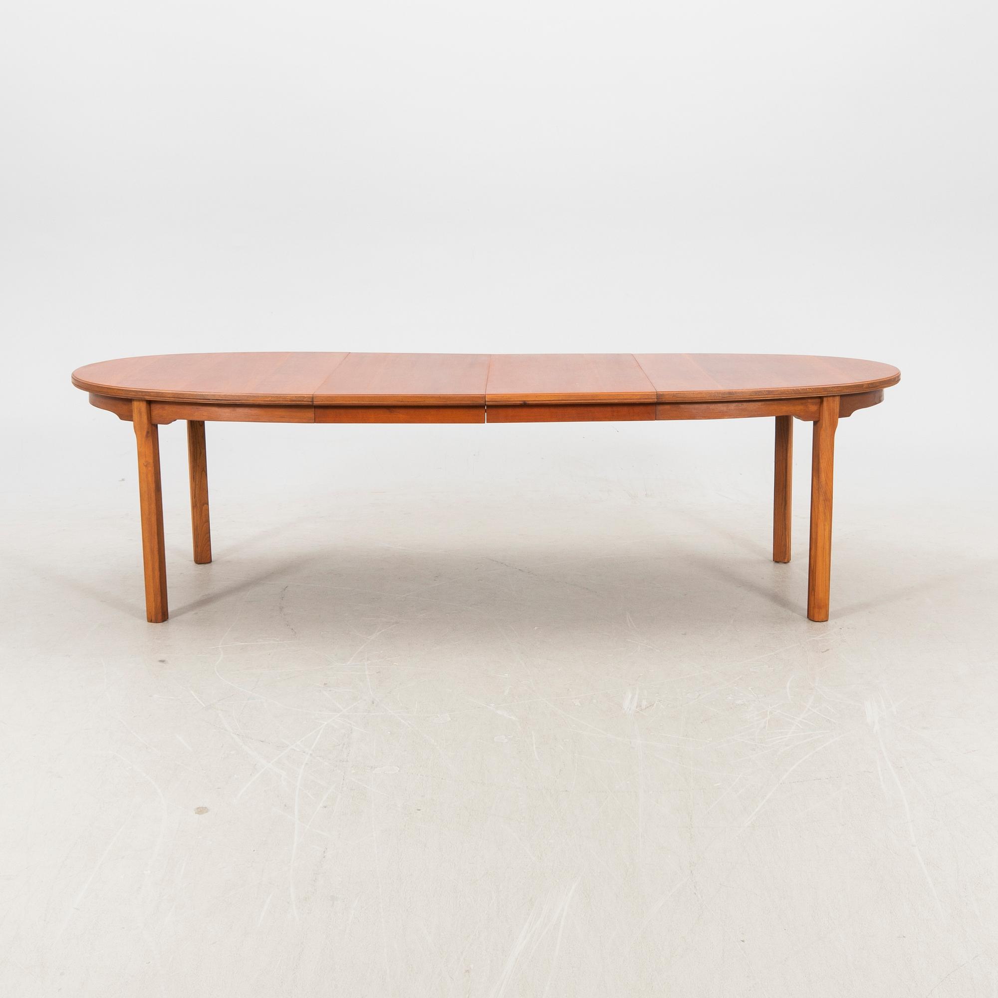 A walnut dining table, "Bristol" 1960s.