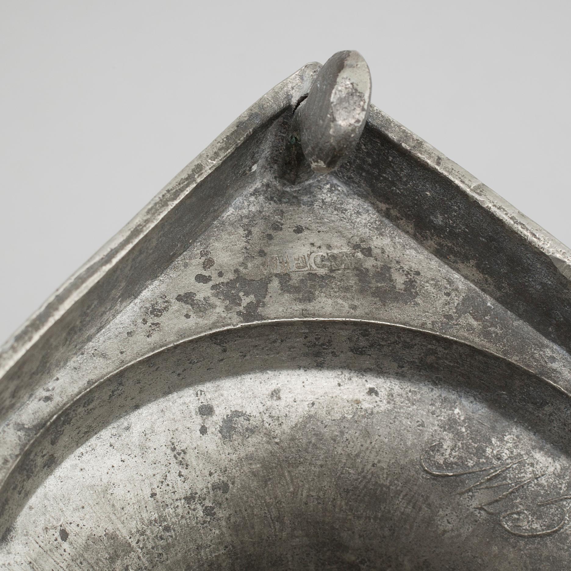 A pair of pewter candlesticks, probably by Gustaf Frederic Wigholm in Eskilstuna, first half of the 19th century.
