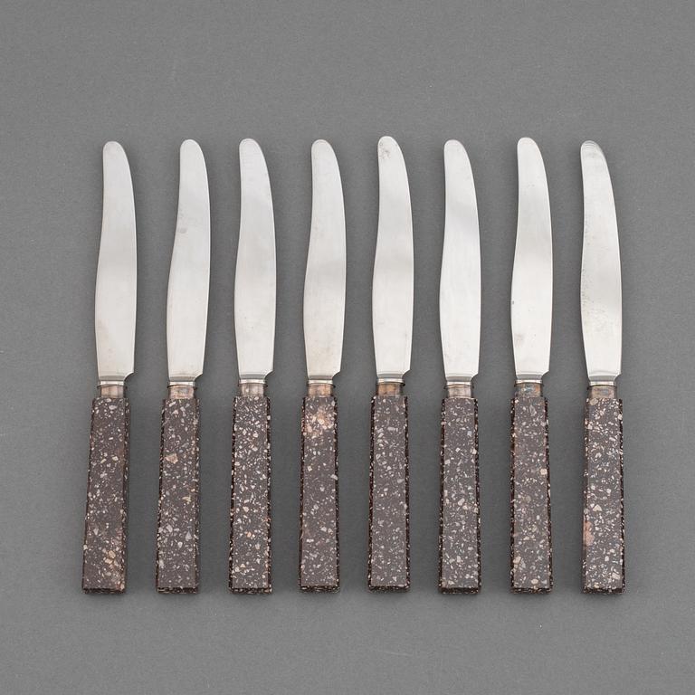 A set of eight porphyr knives, early 20th century.