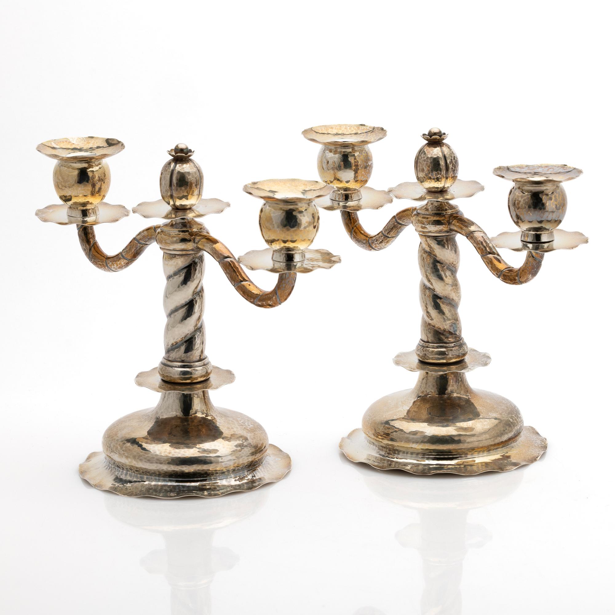 C.G. Hallberg, Pair of candelabra, silver, Stockholm, 1927.