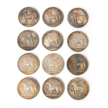 Twelve silver medals, Kungliga Myntverket, Sweden, early 20th century.
