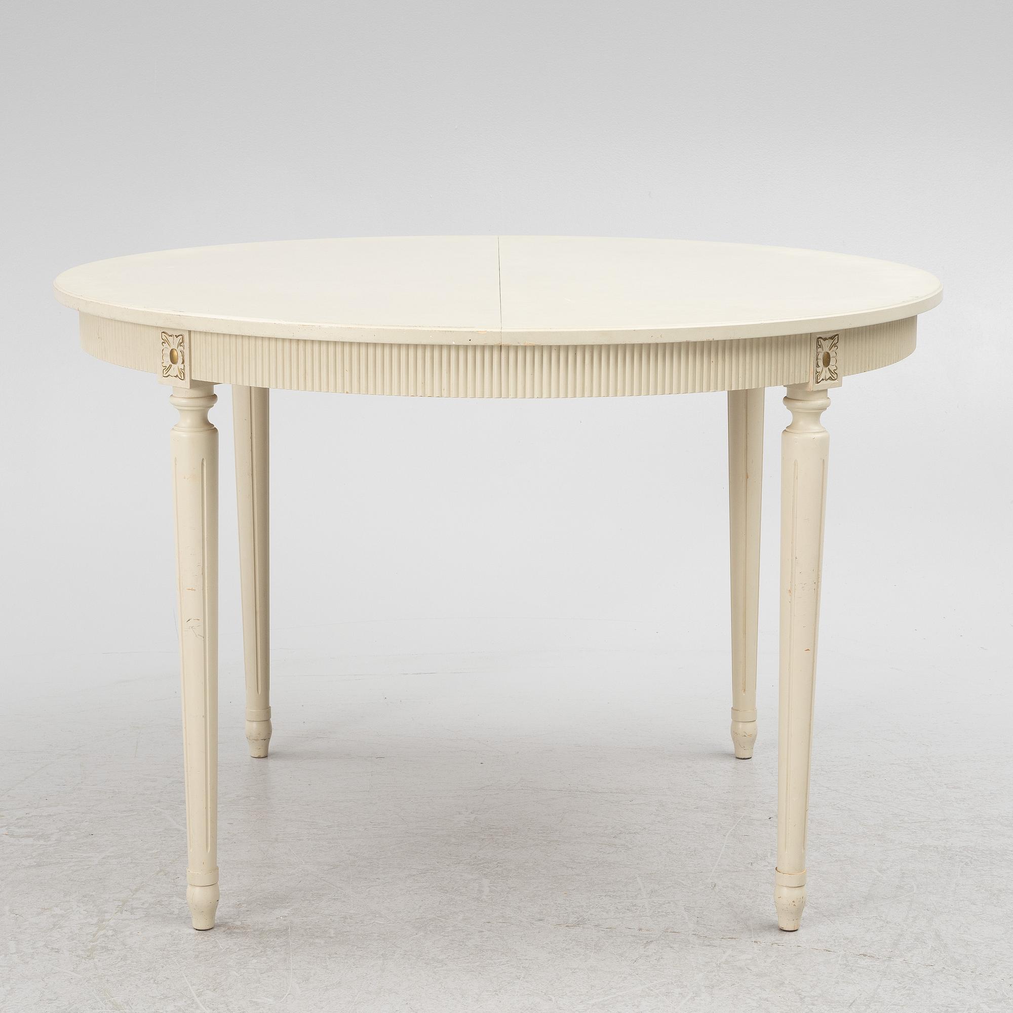 Dining table with six chairs, Gustavian style, second half of the 20th Century.