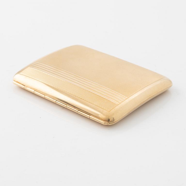 A 14 carat gold cigarette case.