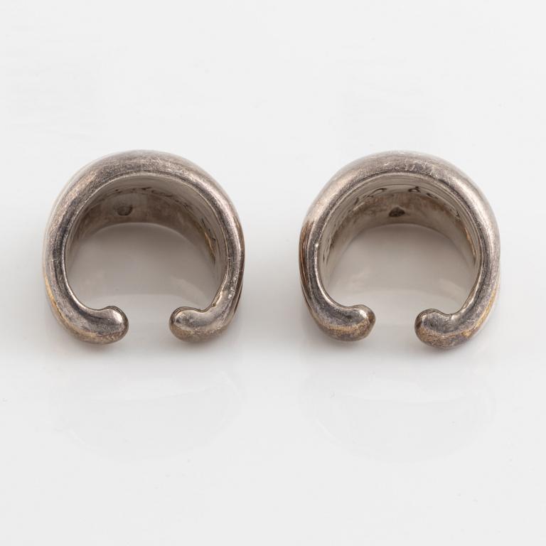 Two silver rings.