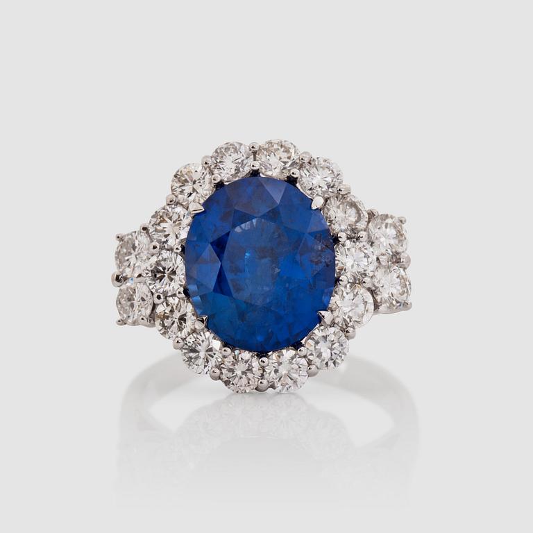 A 5.74 cts sapphire and diamond ring. Total carat weight 1.70 cts.