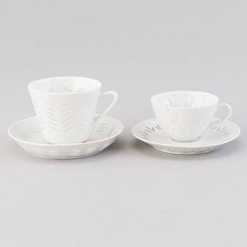 FRIEDL HOLZER-KJELLBERG, A 23-piece porcelain set for coffee and espresso, signed F.H.Kj. Arabia Finland.