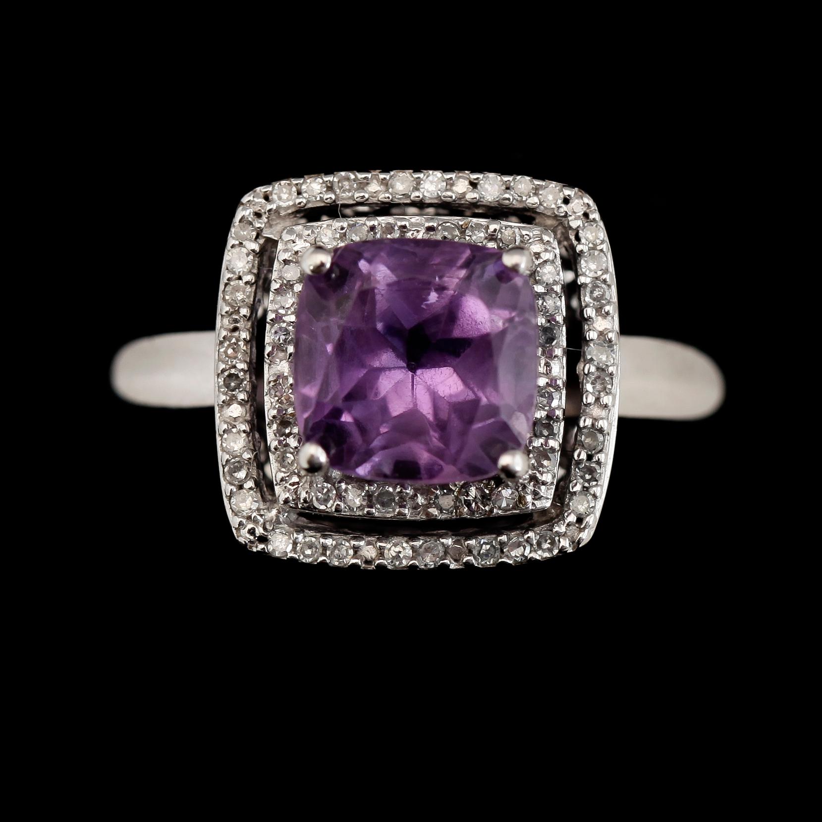 RING, 14K guld, diamanter tot ca 0.25 ct och ametister. Total vikt ca 4,5 g.