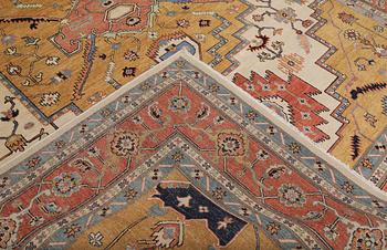 A carpet, Heriz design, approx. 351 x 269 cm.