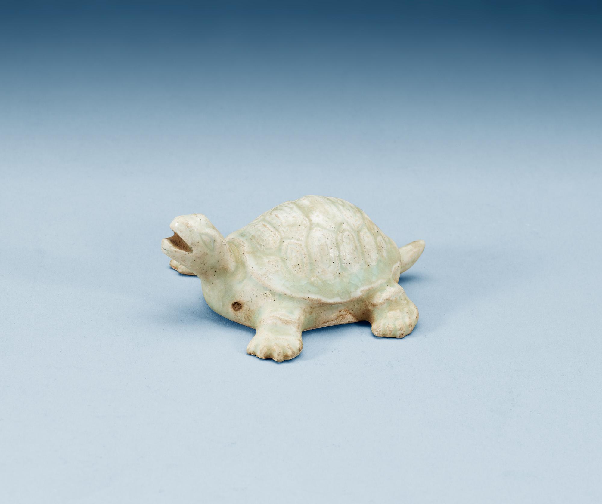 A pale celadon glazed figurine of a turtle, Song dynasty (960-1279).