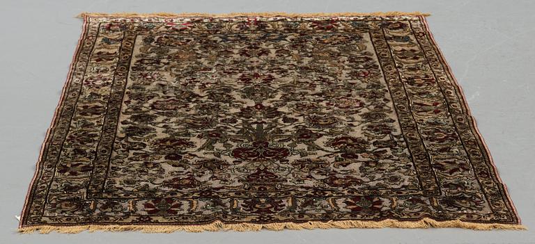 A rug, an antique silk metal brocaded Kashan, probably around 1910, ca 200-202,5 x 129-131 cm.