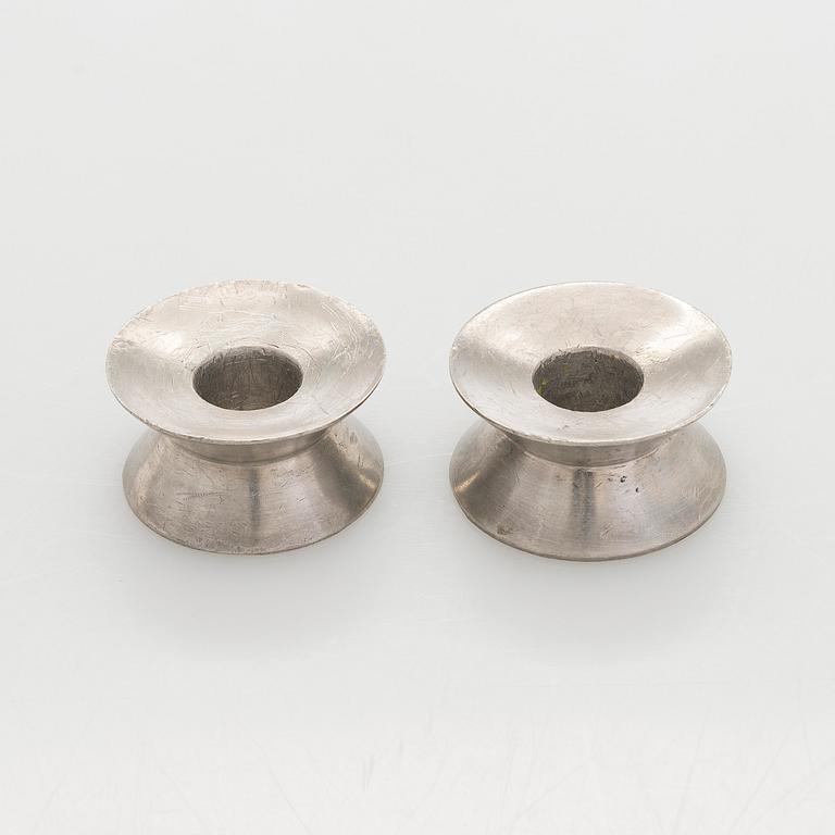 Viljo Hirvonen, a pair of rare mid-20th-century candlesticks manufactured by Valaistustyö for Artek.