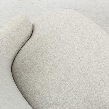 A 'Wingback Micro' easy chair by Tom Dixon.