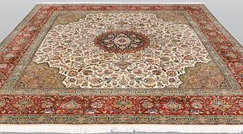 A part silk Tabriz carpet, sk 50 Radj, ca 312 x 296 cm.
