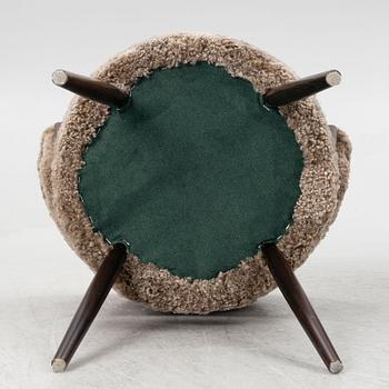 A pair of upholstered armchairs, AB Bröderna Biörs Snickerifabrik, Sweden, 1950's.