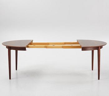Niles Otto Møller, a rosewood veneered table with four chairs, JL Møller, Denmark, 1950's/60's.